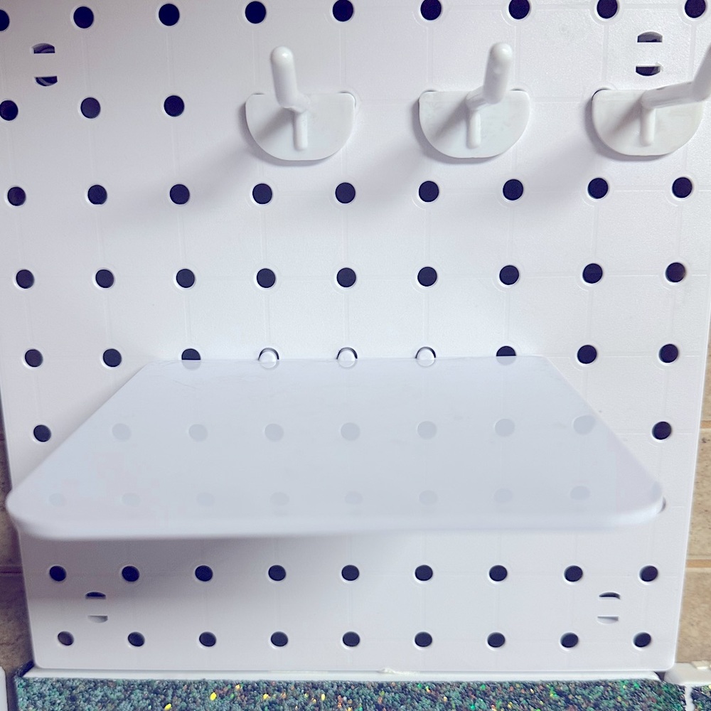 Pegboard wall organizer.